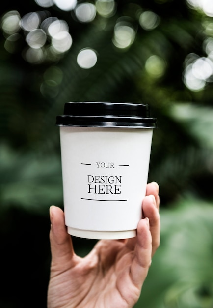 1. Closeup of hand holding paper cup | The Web Univers