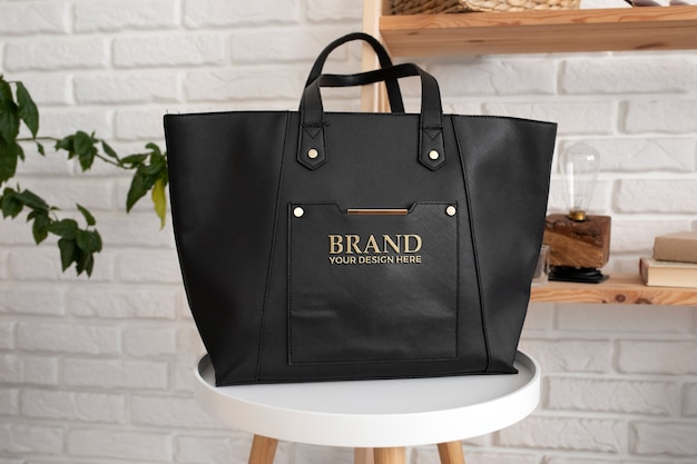 Women's bag embossed golden logo mock-up | The Web Univers