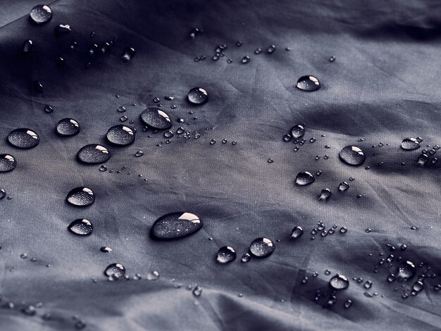 Water drops on waterproof membrane fabric. detail view of waterproof cloth. | The Web Univers