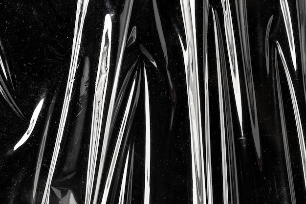 Wrinkled plastic wrap texture on a black background | The Web Univers