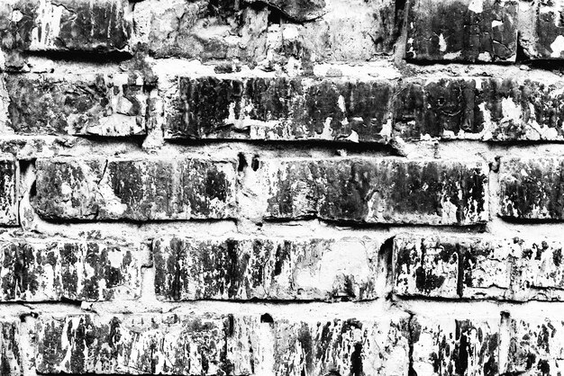 Texture of a brick wall with cracks and scratches which can be used as a background | The Web Univers