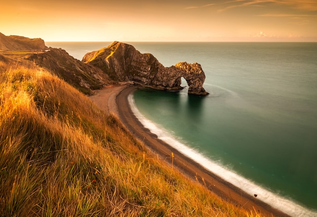 Wonderful sunrise in an august morning at durdle door in dorset england | The Web Univers