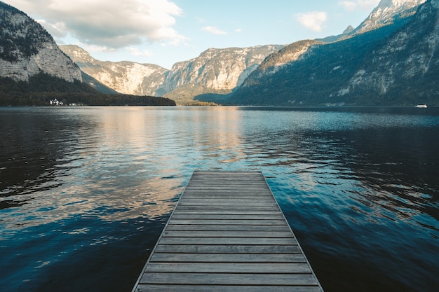 Pier at a lake in hallstatt, austria | The Web Univers