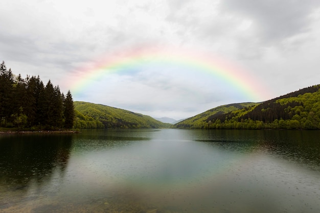 Beautiful landscape with rainbow and lake | The Web Univers