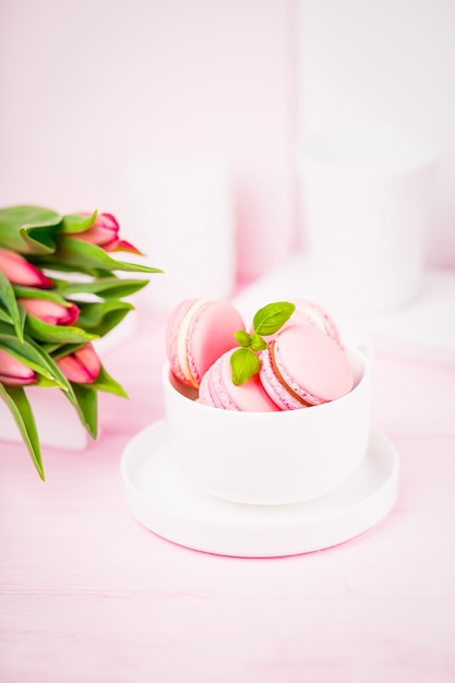 Pale pink macaroons or macarons and spring tulips | The Web Univers